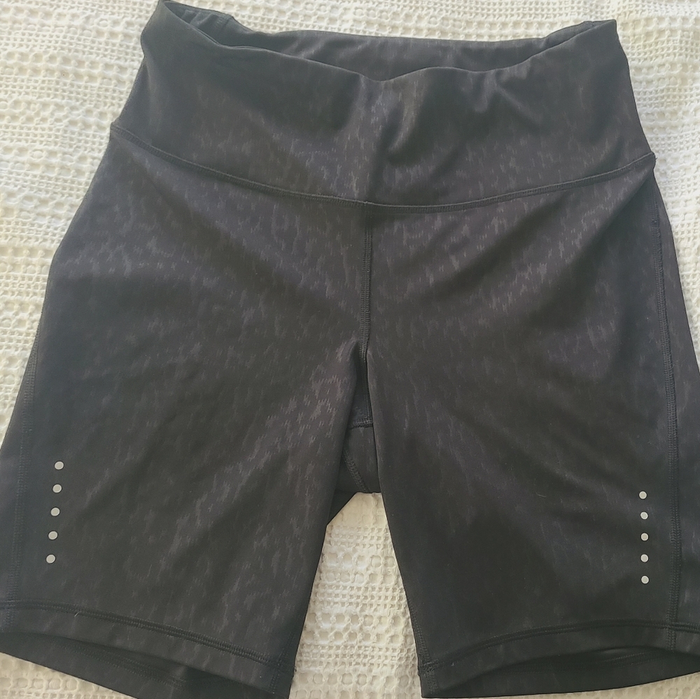 Old Navy Active shorts with zip pocket and reflective detail on legs